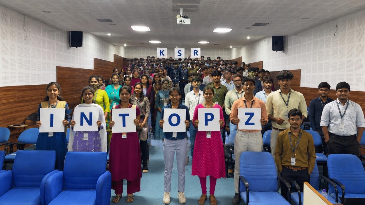 KSR students in an auditorium holding INTOPZ and KSR letters